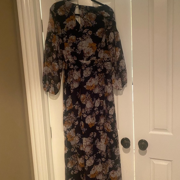 Floral jumpsuit with sheer long sleeves and side tie. Never been worn. - Picture 3 of 6